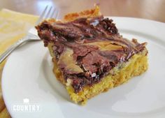 a piece of cake sitting on top of a white plate