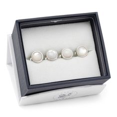 Classic and chic, our Silver and Mother of Pearl Studs grant an immediate ensemble boost to your formal wardrobe. Smooth, iridescent Mother of Pearl discs nestle inside silver-finished settings for a simple, classic look suitable for any event. The expert craftsmanship of our base metal studs ensures long-lasting durability. Pairs perfectly with our Silver and Mother of Pearl Cufflinks. Pearl Cufflinks, Tuxedo Shirt, Tuxedo Shirts, The Expert, Simple Elegance, Pearl Studs, Love Gifts, Base Metal, Designer Outfits Woman