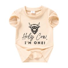 a baby t - shirt with the words, hey cow i'm one on it