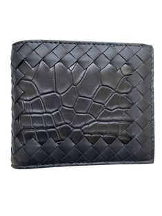 The Bottega Veneta Intrecciato Nappa/Croc Leather Bifold Wallet features 8 interior card slots, two bill compartments, and two additional pockets. Crafted with Nappa Leather and Croc Leather with Calfskin lining, this Italian-made accessory is a wonderful addition to your luxury small leather items collection. Intrecciato leather wallet with croc leather section on the front Eight interior card slots, two bill compartments, two additional pockets Material:100% Calfskin with a frontal croc leathe Small Leather Accessories, New Bottega, Leather Accessory, Ecommerce Website Design, Bottega Veneta Intrecciato, Croc Leather, Leather Bifold Wallet, Bifold Wallet, Leather Items