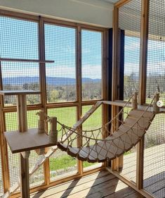 a hammock hanging from the side of a window