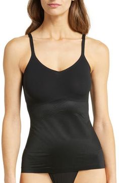 Create a smooth look under everyday outfits with this lightweight, breathable shaping cami that wraps around your body and targets your tummy and sides. The stretchy, single-layer fabric smoothes out any lumps or bumps, and the noncompression bust offers a squish-free fit. 15 1/2" center front length (size Medium) Scoop neck Adjustable straps 77% nylon, 23% elastane body; 55% nylon, 45% Lycra® elastane bust Machine wash, tumble dry Imported Workout Top With Built-in Bra And Second-skin Fit, Supportive Seamless Shapewear For Workout, Second-skin Tank Top With Built-in Bra For Workout, Fitted Seamless Shapewear For Gym, Seamless Shapewear For Gym, Seamless Shapewear Activewear, Supportive Seamless Workout Shapewear, Seamless Fitted Athleisure Shapewear, Seamless Compression Sleeveless Shapewear