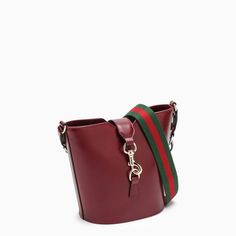 Mini bucket bag by Gucci in Rosso Ancora coloured leather featuring an adjustable and detachable green and red web ribbon and leather shoulder strap, a hook-and-eye closure, linen lining, an internal welt pocket with a zip fastening and gold-tone metal hardware. Width 18,5 cm x Height 20,5 cm x Depth 12,5 cm Shoulder strap length 84 cm Size Type: INTMaterial: LeatherSKU: 782908AADDY/O_GUC-6449_100 Our Products Are 100% Genuine. In All Cases We Stand By The Authenticity Of Every Product Sold On O Mini Bucket, Mini Bucket Bags, Bottega Veneta Shoulder Bag, Louis Vuitton Shoulder Bag, Vuitton Bag, Burberry Bag, Chanel Handbags, Fendi Bags, Prada Bag