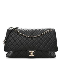 This is an authentic CHANEL Calfskin Quilted XXL Travel Flap Bag in Black. This chic oversized flap is crafted of black calfskin quilted leather in black. The shoulder bag features a rear patch pocket, a chain-link silver shoulder strap threaded with black leather and a leather shoulder pad. The CC turn lock opens to a spacious partitioned black fabric interior with patch pockets and a front zipper compartment. Quilted Leather, Flap Bag, Black Fabric, Shoulder Pads, Front Zipper, Chain Link, Patch Pocket, Calf Skin, Shoulder Strap