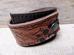 Leather Cuff Wrap Bracelet Twiggy Print in Brown & by Hollyhawk Brown Leather Cuff Bracelets, Brown Cuff Bracelet With Waxed Finish As Gift, Brown Leather Bracelet With Sweatband As Gift, Artisan Brown Leather Bracelet As Gift, Handmade Brown Leather Bracelet For Everyday, Artisan Brown Leather Bracelet For Gift, Artisan Brown Leather Bracelet Gift, Brown Waxed Finish Cuff Bracelet As Gift, Rustic Brown Cuff Bracelet As Gift