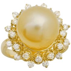 Splendid Natural South Sea Pearl and Diamond 14K Solid Yellow Gold Ring Stamped: 14K Total Natural Pearl Measures: Approx. 12mm Total Natural Round Diamonds Weight: Approx. 0.65 Carats (color G-H / Clarity SI1-Si2) Ring size: 7 (we offer free re-sizing upon request) Ring total weight: Approx. 7.5 grams Disclaimer: all weights, measurements and colors are approximate and may vary slightly from the listed dimensions or as seen in the image. All pictures are magnified to show the smallest of detail Yellow Gold Diamond Ring, Pearl And Diamond Ring, Gold Cocktail Ring, Etsy Gold Ring, Sea Pearl, Gold Band Ring, Natural Pearl, Sea Pearls, South Sea Pearls