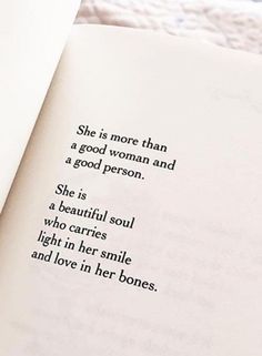 an open book with the words she is more than a good woman and a good person