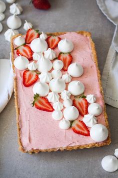 a strawberry cream tart with marshmallows on top