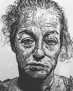 a black and white drawing of a woman's face