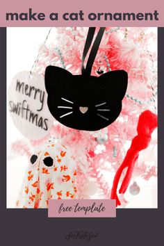 a black cat ornament hanging from a christmas tree with the words make a cat ornament free template