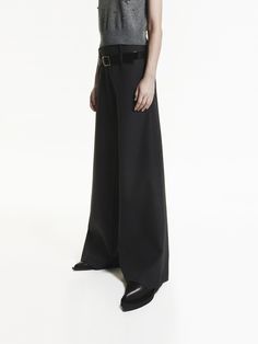 MO&Co. Women's Belted Wide Leg Pants Expertly crafted from a wool blend fabric to fresh perspective to our wide-leg pants this season. It features a double waist design and belt for a casual yet sophisticated touch, while the side invisible zipper and pocket design provide convenience. Additional paneled detailing on the inside adds a touch of unique design to these pants. Features : - Double waist wide leg silhouette- Side invisible zipper and pocket design- Extra paneled detail on the inside- Belted Wide Leg Pants For Formal Fall Occasions, Belted Wide Leg Pants For Formal Fall Events, Modern Wide Leg Wool Pants, Office Wool Wide Leg Pants With Belt Loops, Modern Black Wide Leg Pants With Belt Loops, Chic Wide Leg Bottoms With Belt Detail, Belted Wide Leg Pants For Fall, Modern Wool Wide Leg Dress Pants, Chic Wool Dress Pants With Belt Loops