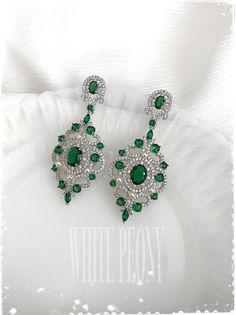 "Art Deco - The Great Gatsby, Downton Abbey, Old Hollywood inspired green crystal chandelier earrings : \"JOSEPHINE\" by ©White Peony by KC. Beautiful crystal chandelier earrings are made of full AAA quality blue / clear Cubic Zirconia (zircon, CZ) Simulated sapphire and Diamond / white gold plated components and hand embellished with small 3mm Swarovski crystal pearl (photo shown in \"white\"). If you don't need peal, you can choose \"NO pearl\". Please note that product colors in photos may ap Elegant Green Plug Earrings For Wedding, Green Chandelier Earrings For Anniversary, Green Cubic Zirconia Chandelier Dangle Earrings, Green Dangle Chandelier Earrings For Anniversary, Green Pierced Bridal Earrings For Wedding, Green Cubic Zirconia Dangle Chandelier Earrings, Gatsby Earrings, Victorian Art Deco, Crystal Chandelier Earrings