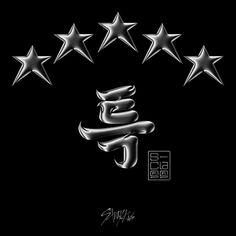 five silver stars and one black background with the word love written in cursive writing