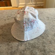 White Bucket Hat With Colorful Splatter Paint Design. 100% Cotton. Never Worn. Excellent Condition. Splattered Paint, White Bucket Hat, Splatter Paint, Paint Design, Paint Splatter, Paint Designs, Art Inspo, Bucket Hat, Red White