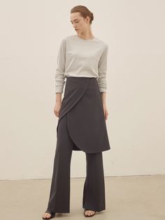 Chic Asymmetrical Hem Bottoms For Work, Elegant Asymmetrical Hem Work Pants, Asymmetrical Bottoms For Workwear In Fall, Versatile Workwear Bottoms With Asymmetrical Hem, Chic Asymmetrical Hem Bottoms For Fall, Chic Bottoms With Asymmetrical Hem For Fall, Versatile Long Skirt For Work, Asymmetrical Hem Pants For Fall Workwear, Wrap Skirt Pants