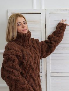 "Brown turtleneck wool sweater with a slightly loose fit, perfect for everyday styles. The chunky, long sleeve design has 3 layers of high quality wool for maximum comfort and coziness. DETAILS - The sweater has 3 layers of wool - Made from 100% wool - The sweater is knitted with 88 oz (2500 g) of high quality premium wool - The model is 170 cm tall (regular S) - The sweater on picture is size XL - As mostly all models in our shop the sweater is loose fit - Colour on photo - brown FIT - The swea Winter Chunky Knit Long Sleeve Polo Sweater, Fall Turtleneck Cable Knit Polo Sweater, Fall Cable Knit Turtleneck Polo Sweater, Winter Long Sleeve Chunky Knit Turtleneck, Casual Wool Turtleneck With Chunky Knit, Casual Wool Chunky Knit Turtleneck, High Neck Wool Sweater For Winter, Casual Chunky Knit Wool Turtleneck, Warm Turtleneck For Cold Weather