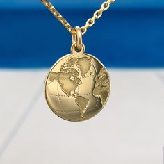 "14K solid gold World Map Necklace, Gold necklace, Earth jewelry, Gold Coin Globe gift, Earth charm, personalized gift, Traveler gift, Nautical Necklace Popular with all age groups. An ideal gift for anyone you love and it will be treasured forever. The pendant is precisely cut out of 14K solid gold by a high-end laser with 4K resolution . The backside can be engraved with names, dates and etc. We don't charge extra money for engraving! HOW TO ORDER 📝 It's very easy 1. Select options from the d Earth Necklace, Gold World Map, Globe Gift, World Map Necklace, Gold Globe, Nautical Necklace, Earth Map, Map Pendant, Map Necklace