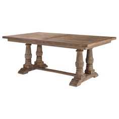 an old wooden table with two pillars on the legs and one leg raised up to it's center