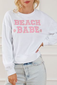 White BEACH BABE Slogan Graphic Casual Sweatshirt Description: Color: White Material: 65% Polyester + 35% Cotton Style: Casual Neckline: Round Neck Silhouette: Shift Sleeve Length: Long Sleeve Occasion: Daily wear This White BEACH BABE Slogan Graphic Casual Sweatshirt is a must-have for any fashion-forward individual. Here are some key features and benefits: Sweet Slogan: The sweatshirt boasts a sweet "BEACH BABE" slogan graphic, adding a fun and playful touch to your outfit. Classic Design: With a crew neck pullover design, this sweatshirt offers a classic and timeless look. Comfortable Fit: The relaxed fit style and drop shoulder design ensure a comfortable and effortless fit for most body types. Versatile: Perfect for daily wear, this sweatshirt is suitable for various occasions, making Winter Shoes Boots, Fall Winter Dresses, White Beach, Boutique Tops, Dresses By Length, Southern Belle, Pullover Designs, Beach Babe, White Sweatshirt