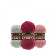 three skeins of yarn in different colors