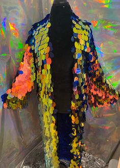 Want to feel like a celestial KWEEN?? Yaaaaas? Than you need this sparkly kimono honey. Perfect for pool parties, nights out, or music festival! Made to order with love. Lining optional. Please list fabric color in comment box at checkout. Top and belt available on website! Please advise, paillete sequins are at high risk of fallout. Must be worn with care. Sequins may fall out if tugged on or worn roughly. Please allow 1-2 weeks to process. Metallic Disco Outerwear For Party, Metallic Sequin Party Outerwear, Metallic Sequined Party Outerwear, Metallic Sequined Outerwear For Party, Multicolor Sequin Fabric For Night Out Disco Style, Iridescent Outerwear For Fall Party, Winter Festival Disco Outerwear, Disco Style Winter Festival Outerwear, Sequin Disco Outerwear For Party