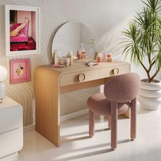 a vanity table with a mirror, stool and potted plant in the corner next to it