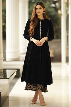 Featuring beautiful embroidery, this Black Velvet Anarkali Suit Which will make you absolutely astoundingly gorgeous and that will be least interesting thing about you. This Closed neck and Qurater Sleeves clothing designed with Dabka, Embroidery, Zari and Stone Work. Available with Velvet Palazzo Pant in Black Color and Black Net Dupatta. Palazzo pant has Zari, Dabka, Stone and Embroidery work. Dupatta embellished in Stone Work./p> Slight color variation may occur due to photographic reasons Velvet Anarkali Suits, Velvet Anarkali, Velvet Kurta, Nikkah Dress, Women Suits, Velvet Suit