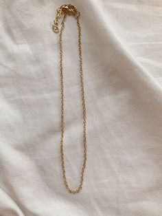 This necklace is 14 inches long and has a 2-inch extender chain so it can be adjusted to be 14-16 inches long! Metal Necklace With Delicate Chain And Round Pendant, Delicate Metal Necklace With Round Pendant, Dainty Locket Necklace With Adjustable Chain, Adjustable Heart Pendant Necklace, Dainty Round Pendant Locket Necklace With Adjustable Chain, Delicate Metal Chain Necklace As Gift, Elegant Locket Necklace With Adjustable Chain, Dainty Metal Link Necklaces, Dainty Pendant Charm Necklaces