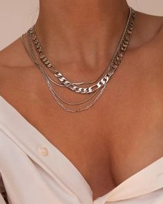 Here A Girl Has A Silver Chandon Necklace Around Her Neck Triple Chain Necklace, Figaro Chain Necklace, Luv Aj, Charm Necklace Silver, Figaro Chains, Waterproof Jewelry, Online Fashion Boutique, Silver Chain Necklace, Fashion Essentials