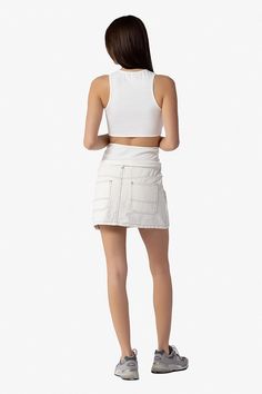 COLOR: WHITE DETAILS Denim cargo mini skirt Low rise Contrast stitching Front button and zipper fastening Classic 5 pocket design Belt loops at waist 100% Cotton Please refer to the care label for garment care instructions SIZE & FIT: runs TTS, model wears size S MODEL INFO: HEIGHT 5’9, WAIST 24in, BUST 31in Fitted Denim Skirt With Cargo Pockets, High Waist Cotton Mini Skirt With Button Zip Fly, White Mini Denim Skirt With Pockets, White Denim Mini Skirt With Pockets, Casual White Cargo Skirt, White Fitted Cargo Skirt Casual Style, Casual Fitted White Cargo Skirt, White Fitted Cargo Skirt, Casual Style, White Cotton Mini Cargo Skirt