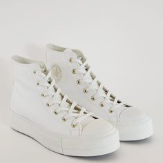 Converse Chuck Taylor All Star Hi High Top Mono White Leather Vintage White / Egret / Gold Women's Platform Sneakers / Boots A03719c Nwt Brand: Converse Model: Chuck Taylor All Star Lift Hi Style Code: A03719c Color: Vintage White / Egret / Gold Gender: Women's Size Guide: Us Women's 10.5 / Uk 8.5 / Eur 42 / Cm 27 Platform Chucks Get Dressed Up For The Season With Luxe Details To Set Your Style Apart. A Smooth, Faux Leather Upper And Clean White Midsole Make Pairing Your Shoes With Your Wardrobe Converse Sneakers With White Laces For Spring, White Wedge Sneakers With Laces, Converse High-top Lace-up Sneakers, White Ankle-high Wedge Sneakers For Spring, Casual White Mid-top Wedge Sneakers, Converse White Leather Platform Sneakers, Cream High-top Platform Sneakers, White High-top Converse Sneakers, Converse High-top Lace-up Sneakers With White Laces