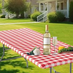 a picnic table with a bottle of wine on it