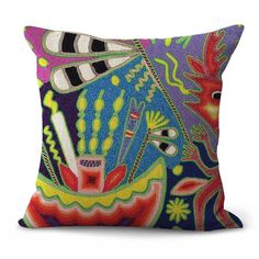 two pillows with colorful designs on them