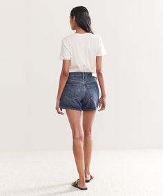 Mid Rise Boy Short Whiskey Indigo Re/Done began in 2014 as a luxury jeans collection, altering heritage Levi's into new pairs. Since then, the label has expanded to create its own cult denim line based on favorite shapes from its collections. 100% organic cotton. Mid-rise fit with mid-length inseam and clean hem. Made in Turkey. Please note that this item is not eligible for promotions. Luxury Jeans, Cocoon Cardigan, Jeans Collection, Jenni Kayne, Boy Shorts, Clutch Handbag, Tank Dress, Tee Shop, Jacket Tops