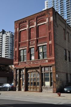 an old red brick building in the city