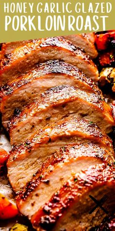 sliced pork loin roast on a plate with broccoli and carrots in the background