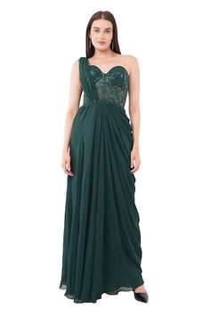 Green gown with sequin bead embellished bodice with attached drape and pleated waistline. - Aza Fashions Sequin Draped Dress For Reception, Embellished Draped Evening Dress, Embellished Pre-draped Evening Dress, Pre-draped Embellished Gown With Traditional Drape, Embellished Pre-draped Gown With Traditional Drape, Embellished Draped Gown For Reception, Pre-draped Embellished Gown For Reception, Green Embellished Gown With Sweetheart Neckline, Pre-draped Sleeveless Embellished Dress