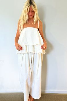 Toit Volant wide leg pants. Textured woven fabric with a stiff hand and elastic waist. Wide Leg Parachute Pants For Summer Day Out, Summer Wide Leg Parachute Pants For Day Out, White Cropped Bottoms For Daywear, Chic Cropped Bottoms For Daywear, Cotton Wide Leg Harem Pants For Day Out, Cropped Cotton Wide Leg Pants For Spring, Daywear Harem Pants With Elastic Waistband, Summer Cropped Wide Leg Loungewear Pants, Cropped Wide Leg Summer Loungewear Pants