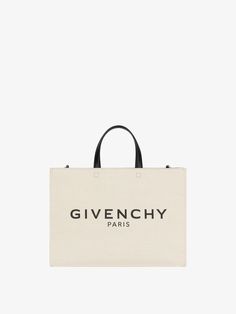 Medium G Tote shopping bag in canvas | GIVENCHY Paris Black Color Combination, Givenchy Bag, Givenchy Paris, Givenchy Women, Leather Cap, Medium Tote, Signature Print, Black Canvas, Leather Top