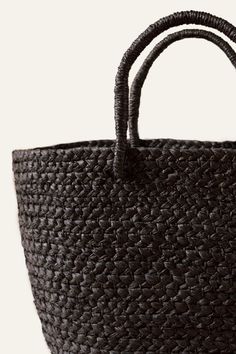 The perfect every-day bag, our Braided Raffia Day Bag is skillfully crafted by our female artisan partners in Rwanda. 16" W x 5" D x 10" H (4" Handle Drop) Black hand-dyed fibers Made from locally sourced natural braided raffia Unlined interior and sturdy handles This lightweight handbag pairs nicely with a sundress and is the perfect size to hold all of your necessities! Impact The artisan sector is the second largest employer in the developing world. Yet the majority of artisans are women who Raffia Weaving, Vocational Skills, Book Clutch, Olympia Le Tan, Social Enterprise, Black Hand, Day Bag, Women Artisans, Bago