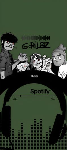 two people sitting at a table in front of a microphone and sound board with the words gorillaz on it