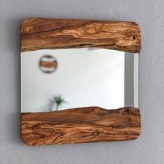 MirrorTraders.com This wall mirror is made from two pieces of carefully selected olive wood with live edge. Material: Olive Wood, Glass Mirror. - The wood of each mirror is unique! - This wall mirror can be turn as you want. Wood Mirror Bathroom, Chainsaw Wood Carving, Lounge Mirrors, Wood Frame Mirror, Shabby Chic Mirror, Wood Framed Mirror, Vintage Mirrors, Frame Mirror, Cool Mirrors