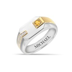 A distinctive piece crafted just for you… This striking two-toned ring features your genuine birthstone set in a 14kt gold-plated border that cascades down the side of the ring shank.4 genuine diamonds wrap around the ring shank for a bold and sophisticated look.As the final finishing touch, the inner ring shank is masterfully engraved with YOUR name!Genuine birthstones: January - Garnet, February - Amethyst, March - Aquamarine, April - White Topaz, May - Emerald,&nbsp Gold Birthstone Ring With Accent Stones For Formal Events, Gold Birthstone Ring With Accent Stones For Formal Occasions, Formal Gold Birthstone Ring With Accent Stones, Anniversary White Gold Birthstone Ring With Polished Finish, Gold Sterling Silver Birthstone Ring With Accent Stones, Modern Birthstone Diamond Ring For Anniversary, Modern Gold Topaz Birthstone Ring, Modern Diamond Ring With Birthstone For Formal Occasions, Modern White Gold Birthstone Ring With Accent Stones