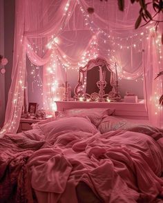 a pink bedroom with fairy lights on the ceiling and bed in the foreground,