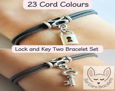 More fab bracelets in my shop  😊 ⤵ www.etsy.com/shop/BatEarsBracelets The 🔑 Key Charm is approx. 17x8mm and the 🔒 Padlock Charm is approx. 14x8mm.  ➿Cord Charm Bracelet - unisex - adults - children - everyone! ➿Made with quality, strong 2mm Micro Paracord. It doesn't fade, it is washable, wearable, durable, fun and smart.  ➿23 Cord Colours to choose from - adjustable with the sliding knots from approx. 12cm to 25cm - one size should fit all! ➿Two bracelets - one with a key and one with a padlock. ♻️ No single use plastic here 😊 🌱cards and envelopes are paper 💚 even the padded envelope is made of paper ♻️ paper packing tape used 🌳reusable gift bag🛍️ 📮 Posted same day if ordered before 1pm Monday - Friday for UK orders. All UK orders will be sent Royal Mail 1st Class. USA orders wil Bff Lock Bracelets, Bracelets That Lock Wirh A Key, Key Bracelet, Couples Bracelet, Reusable Gift Bags, Couple Bracelets, Letter Charms, Metal Charm, Personalize Bag