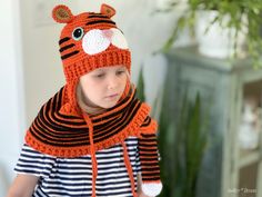 Put the wild back in your wardrobe! Hunter The Tiger Hat and Scarf are sure to add a ferocious touch to all your favorite outfits, so you can roar your way to fashion greatness! This pattern is for all ages and sizes, from tiny cubs to adult tigers - crochet cuteness for the whole family. The instructions are written row-by-row in American crochet terms, along with crochet diagrams, step-by-step photos, and a conversion chart to UK terms. FORMAT & LANGUAGES: * English * PDF, 15 pages and 3.7 MB (mobile devices friendly) CROCHET LEVEL & SKILLS: * Intermediate * Chain, slip stitch, single crochet, back/front post single crochet, half double crochet, half double crochet in third loop, double crochet, back/front post double crochet, working in rows and the round, increasing, decreasing, sewing Tiger Scarf, Crochet Diagrams, Red Heart Super Saver Yarn, American Crochet, Christmas Hats, Front Post Double Crochet, Scarf Crochet, Autumn Drives, Hat And Scarf