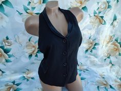 90s Vintage women's black formal vest/waistcoat open back. Size S-M. Vest in excellent vintage condition. Bust 90cm (35.4in), Waist 80cm (31.5in), Vest Length 50cm (19.6in). Black Formal Summer Vest, Black Summer Formal Vest, Fitted Vest For Night Out In Spring, Tailored Sleeveless Vest For Night Out, Black Formal Vest For Spring, Formal Fitted Summer Vest, Fitted Vest For Office Spring Season, Fitted Office Vest For Spring, Fitted Black Vest For Evening