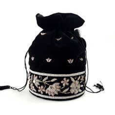 "Look your best wearing this luxurious black velvet bucket bag potli bag, exquisitely embroidered with glittery metallic copper flowers and embellished with genuine semi precious stones. It is certain to bring you compliments. Perfect for Indian wedding or for going on the town! Expertly hand embroidered by third generation master zardozi artisans. Of exceptional quality. - 9\" x 6\", useable interior space 6\" x 6 \". - Rigid bottom and 2\" base, so bag sits nicely. - Wrist cord with tassel, 6 Outfit Claims, Beaded Pouch Bag, Bride And Prejudice, Copper Flowers, Embroidered Clutch Bag, Embellished Purses, Beaded Pouch, Potli Bag, Vintage Evening Bags