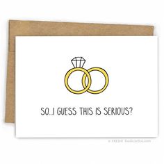 a card with two wedding rings and the words so i guess this is serious?