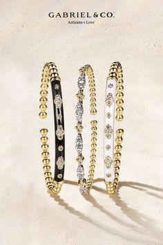 With every curve, these bangles promise to make every moment feel a little more luxurious. Luxury Beaded Jewelry Bracelet, Luxury Beaded Bracelet Jewelry, Luxury Yellow Gold Stackable Beaded Bracelets, Luxury Stackable Yellow Gold Beaded Bracelets, Luxury Beaded Bracelets With Diamond Accents, Fine Jewelry White Bangle, Fine Jewelry Beaded Bracelets With Diamond Accents, Luxury White Bangle Jewelry, Beaded White Gold Round Jewelry